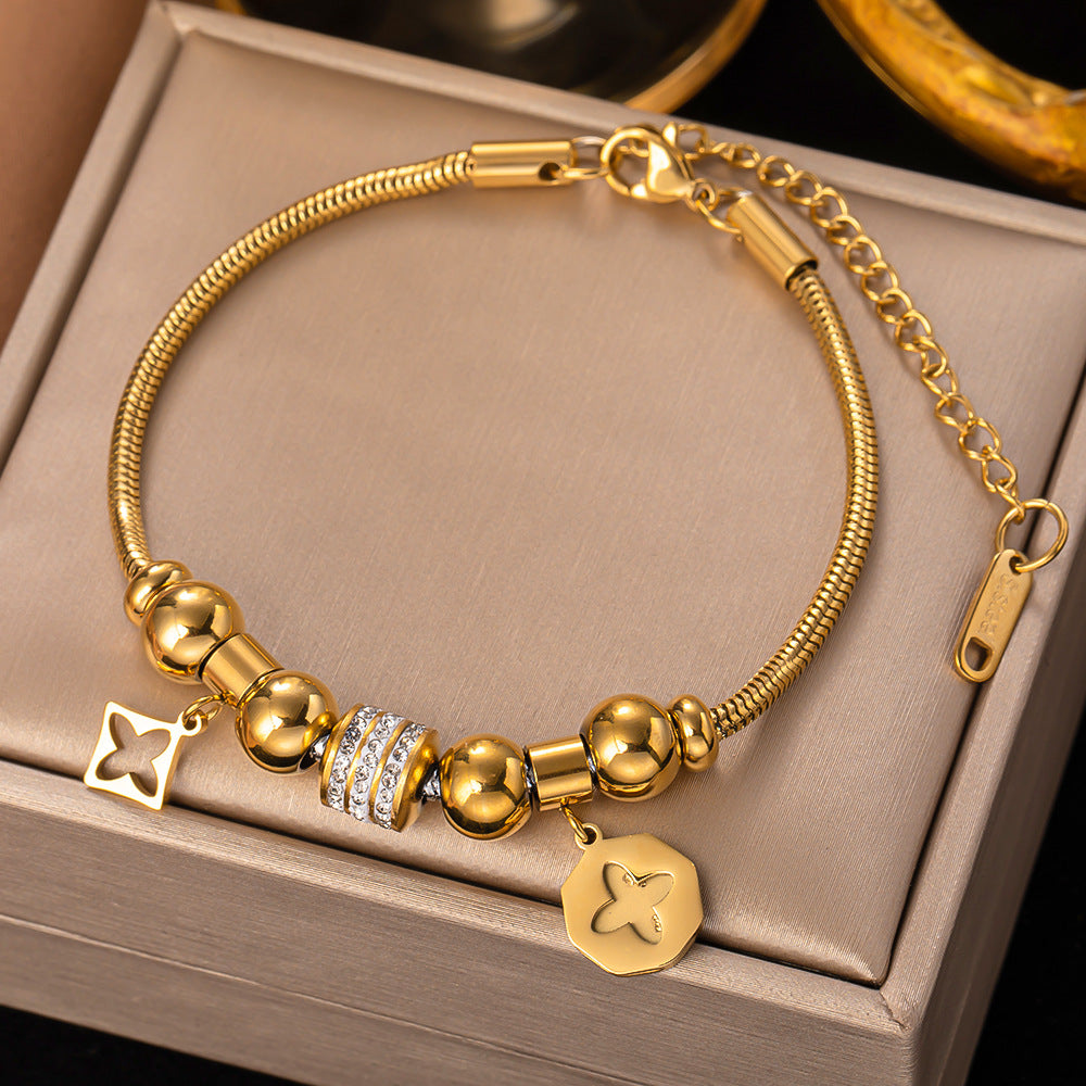 Bracciale farfalla e fiore con occhio