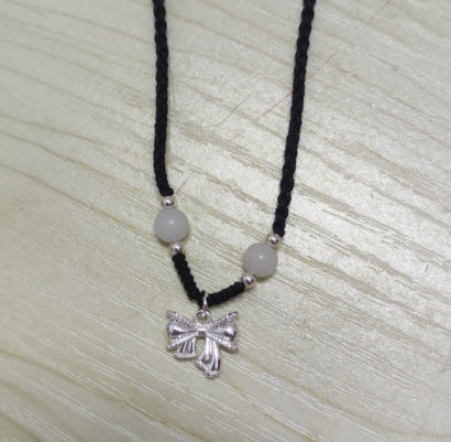 Collana fiocco intrecciata oro
