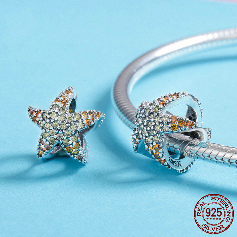 Bracciale argento con perline e charm