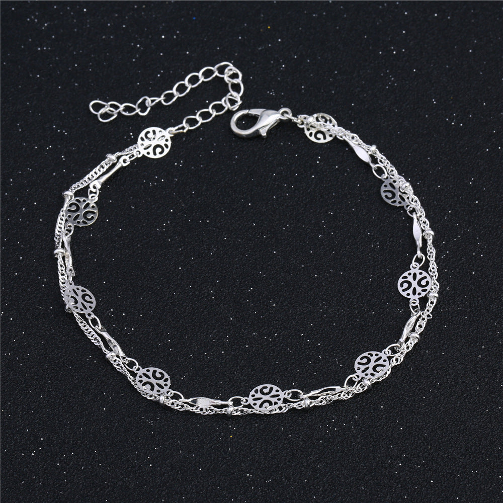Cavigliera con charm argento