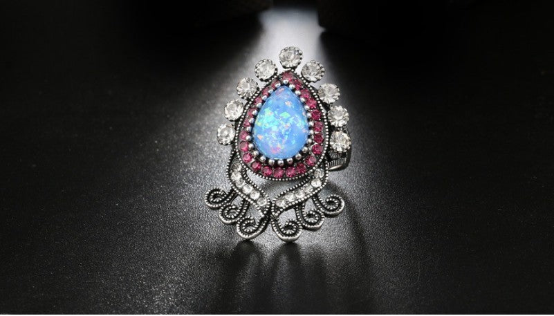 Anello argento fiore opale blu