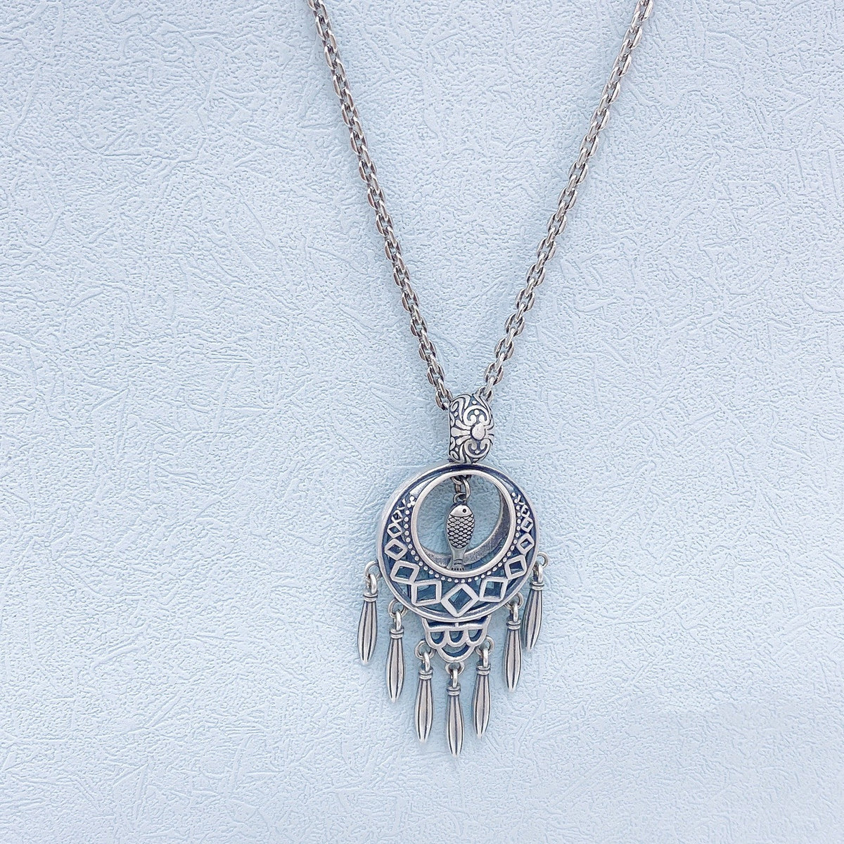 Collana pesce e fiore