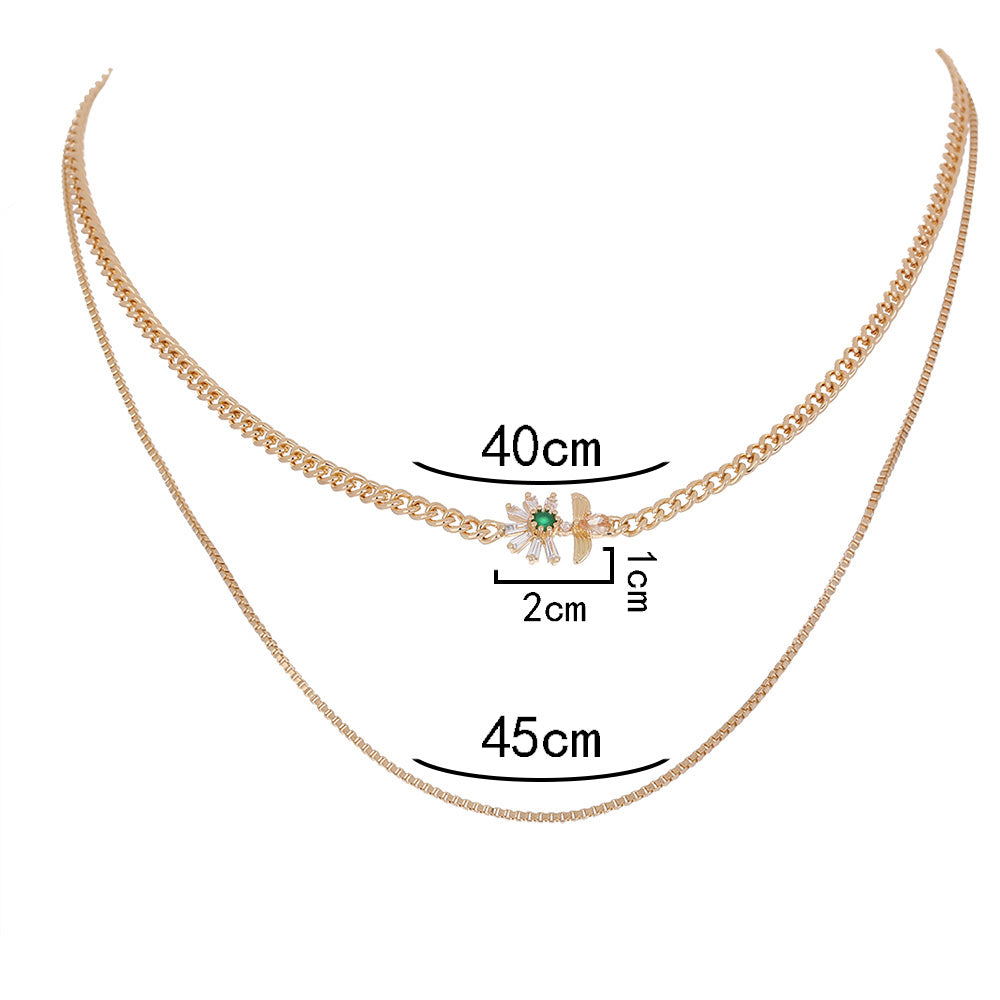 Collana farfalla fiore multistrato