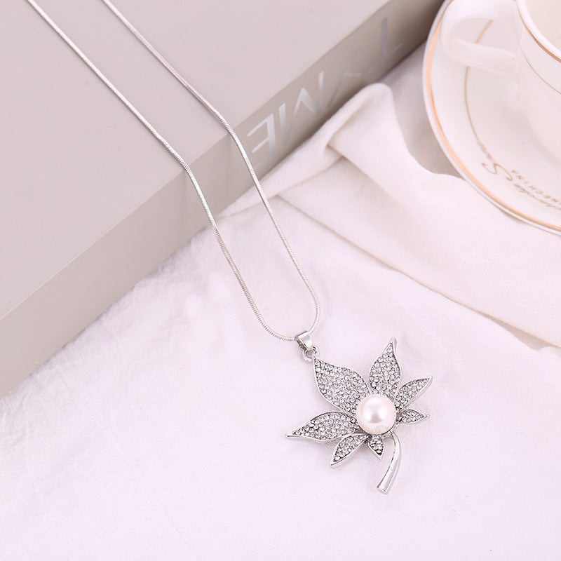 Collana foglie diamanti