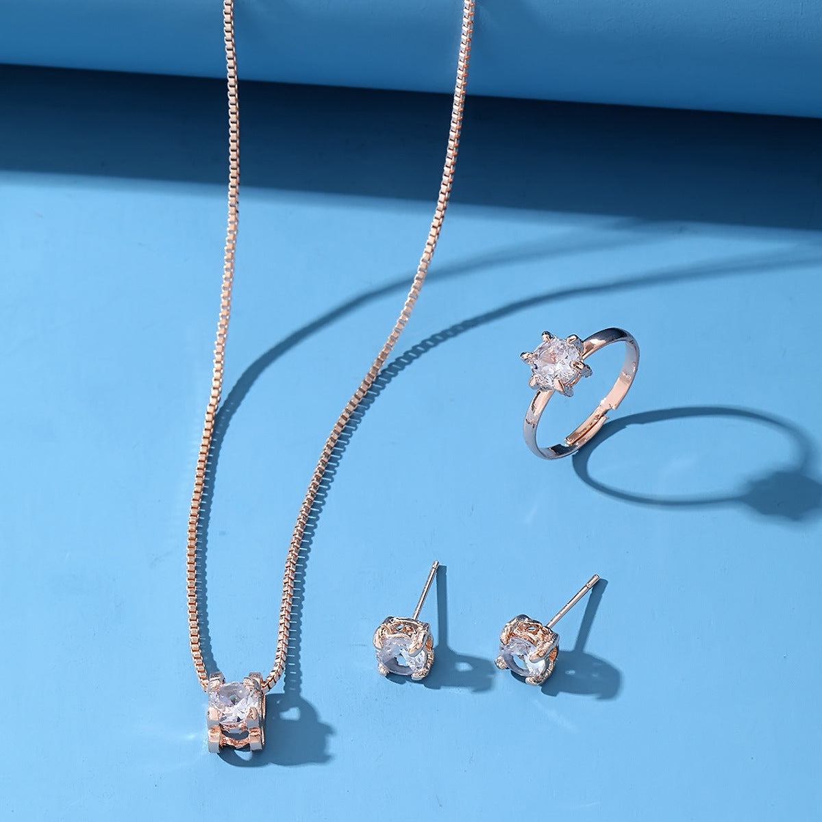 Set collana e orecchini geometrico diamante