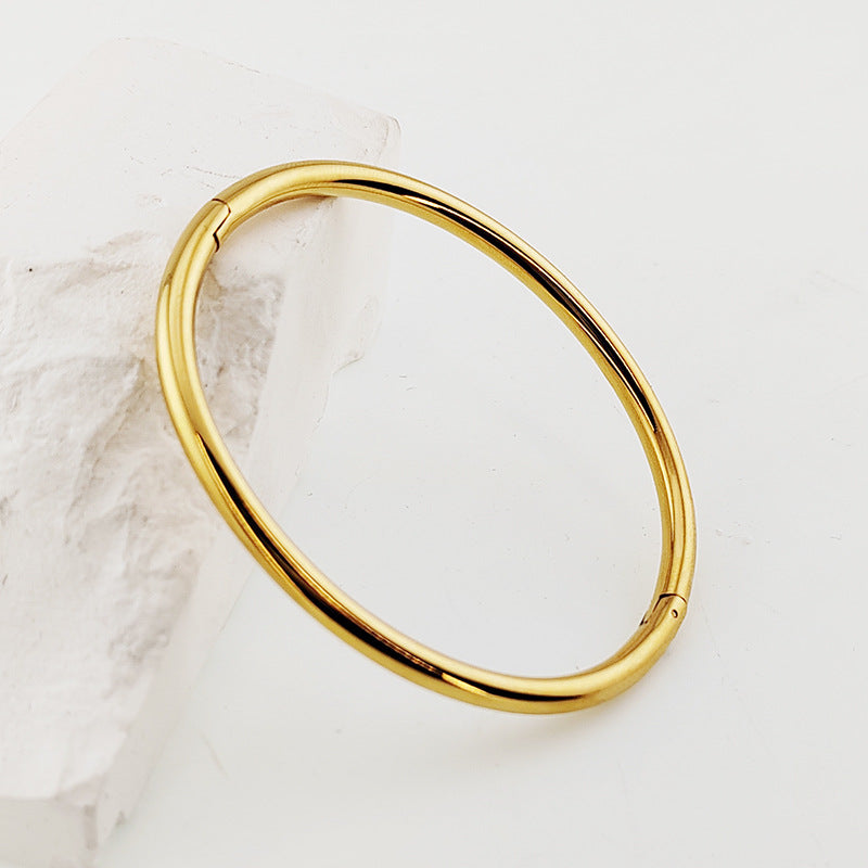 Braccialetto Titanio Oro