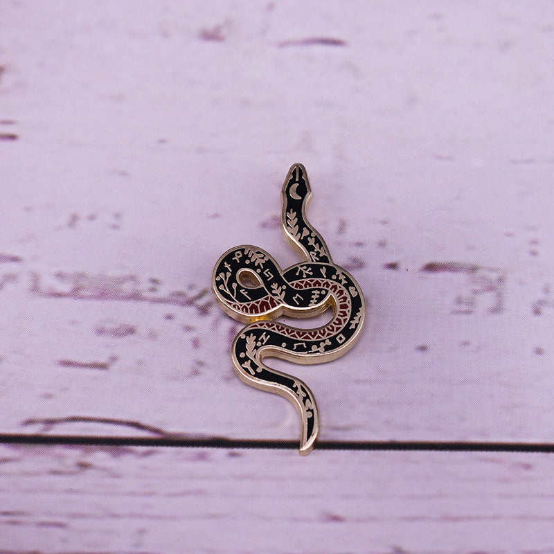 Spilla serpente e luna