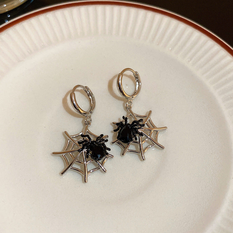 Orecchini geometrici con diamanti