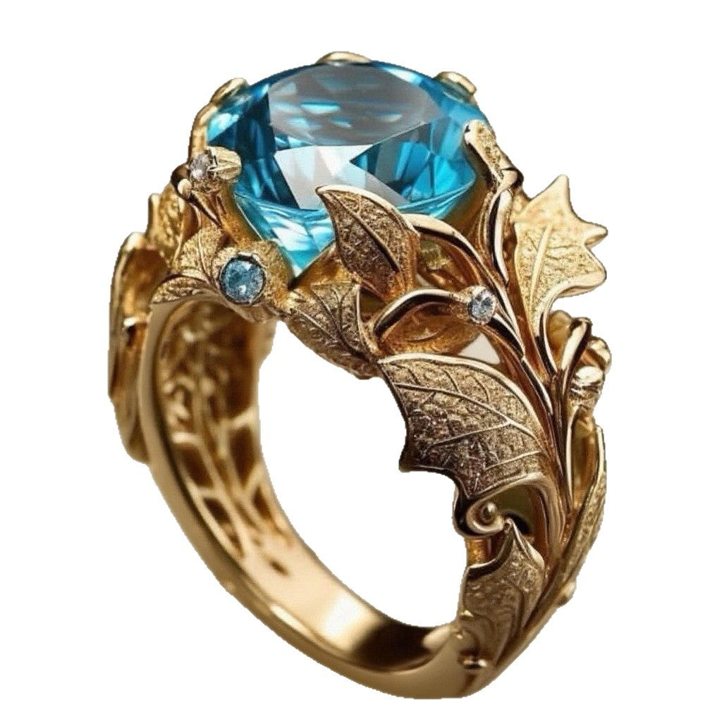 Anello placcato oro pietra blu
