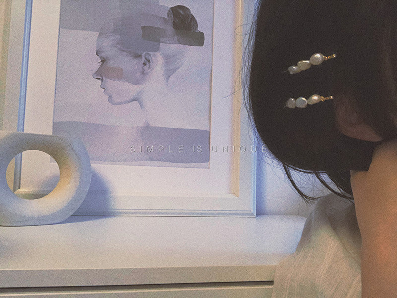 Fermagli perla barocca