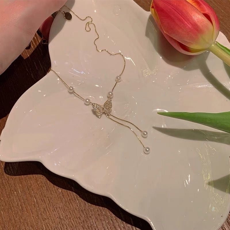 Collana farfalla e perle da donna