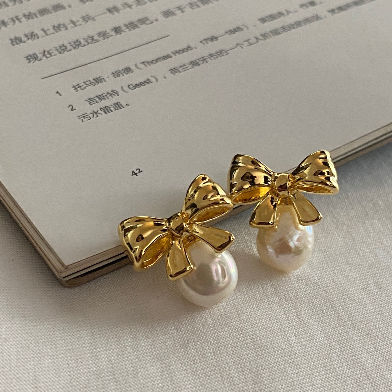 Orecchini perla barocca argento