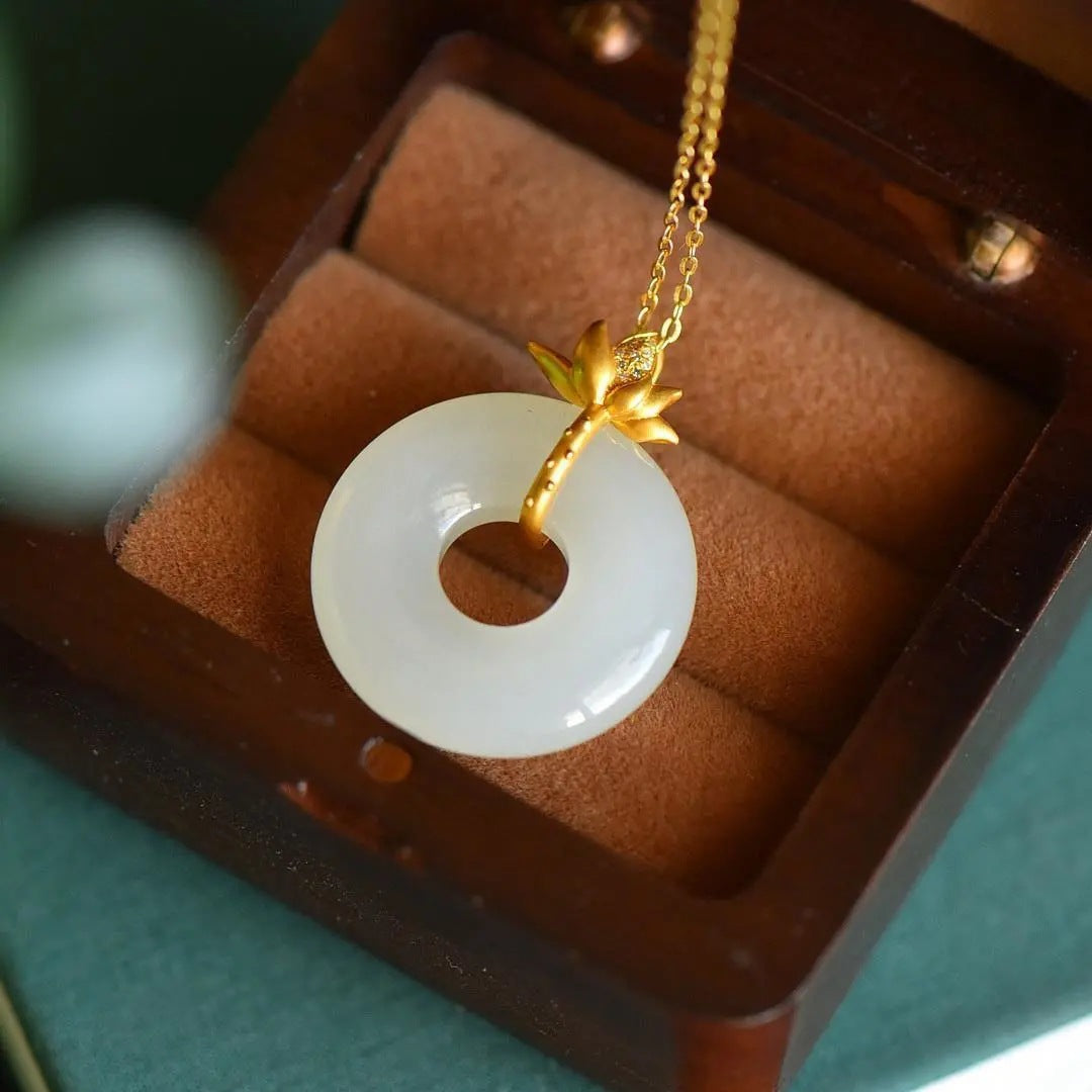 Collana pendente fiore di loto dorato