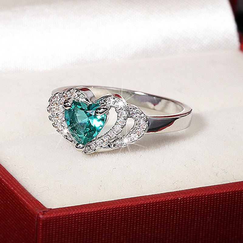 Anello cuore con zircone verde