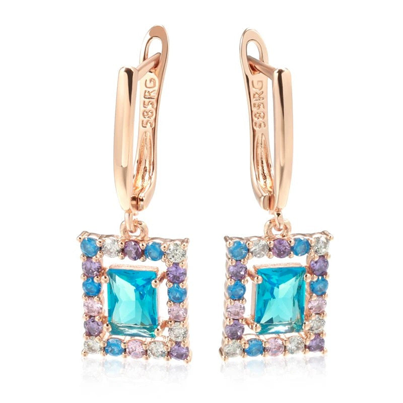 Orecchini geometrici oro rosa zirconi