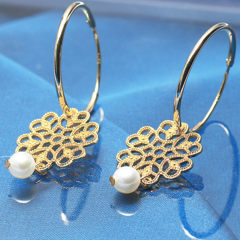 Orecchini barocchi con perle