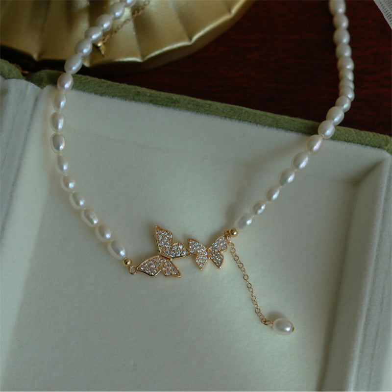 Collana farfalla con perla vintage