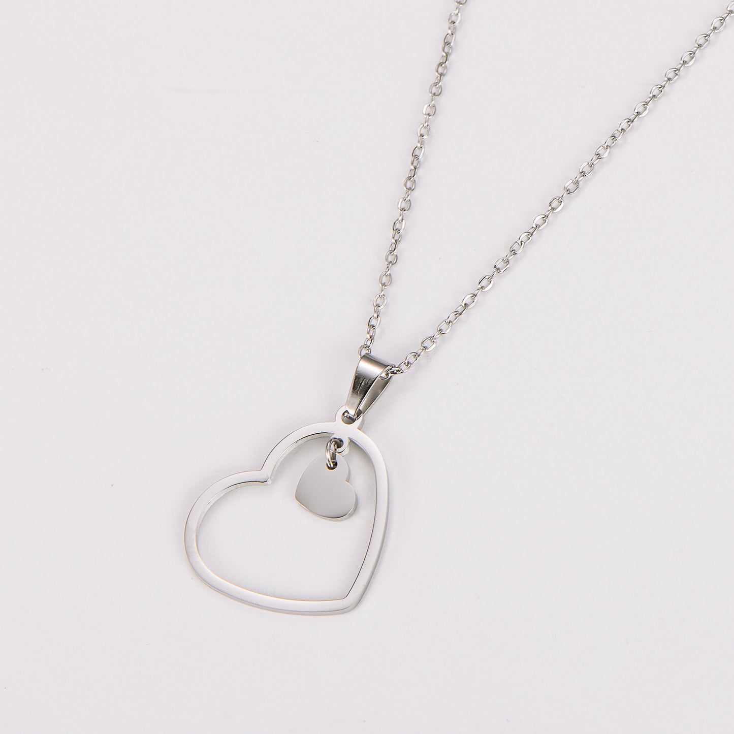 Collana doppio cuore minimalista