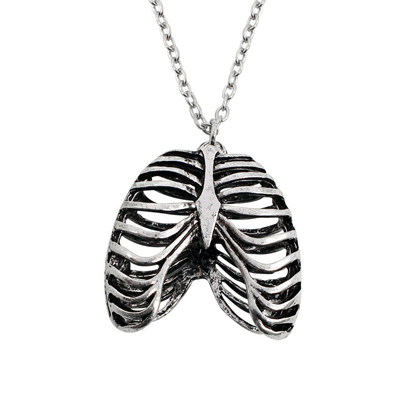 Collana teschio e cuore anatomico