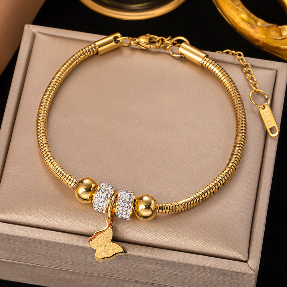 Bracciale farfalla e fiore con occhio