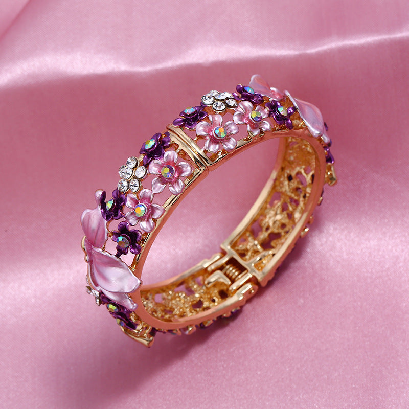 Bracciale farfalla e fiore aperto