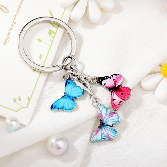 Collana pendente farfalla colorata