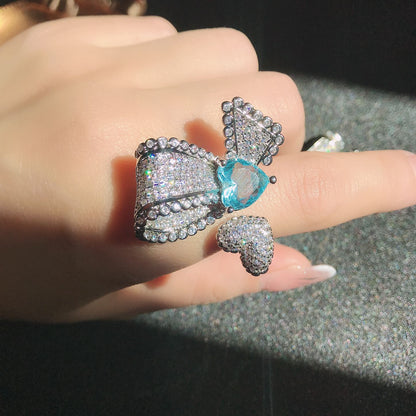 Anello farfalla asimmetrico