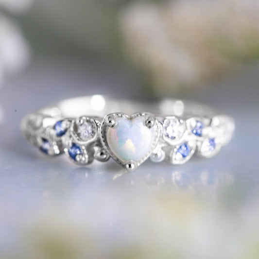 Anello cuore opale a forma di pesca