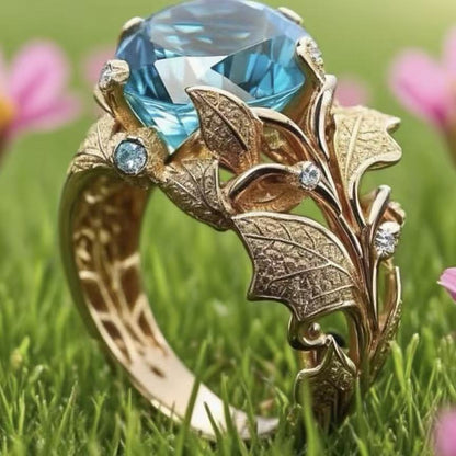 Anello placcato oro pietra blu