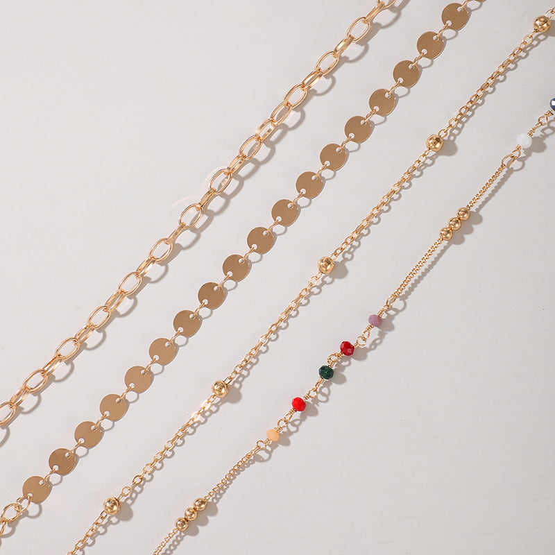 Cavigliera perline colorate set di 4