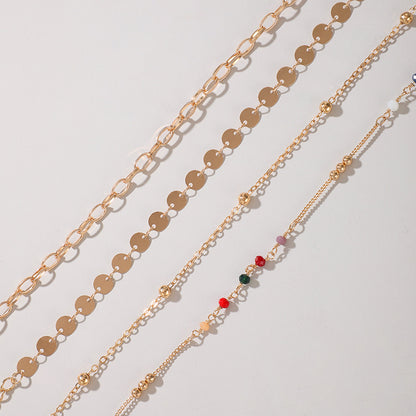 Cavigliera perline colorate set di 4