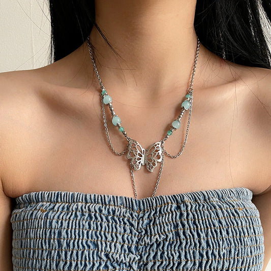 Collana farfalla nappa con perle