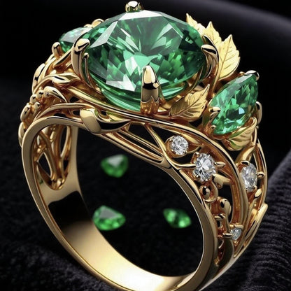 Anello smeraldo e diamanti con decoro floreale
