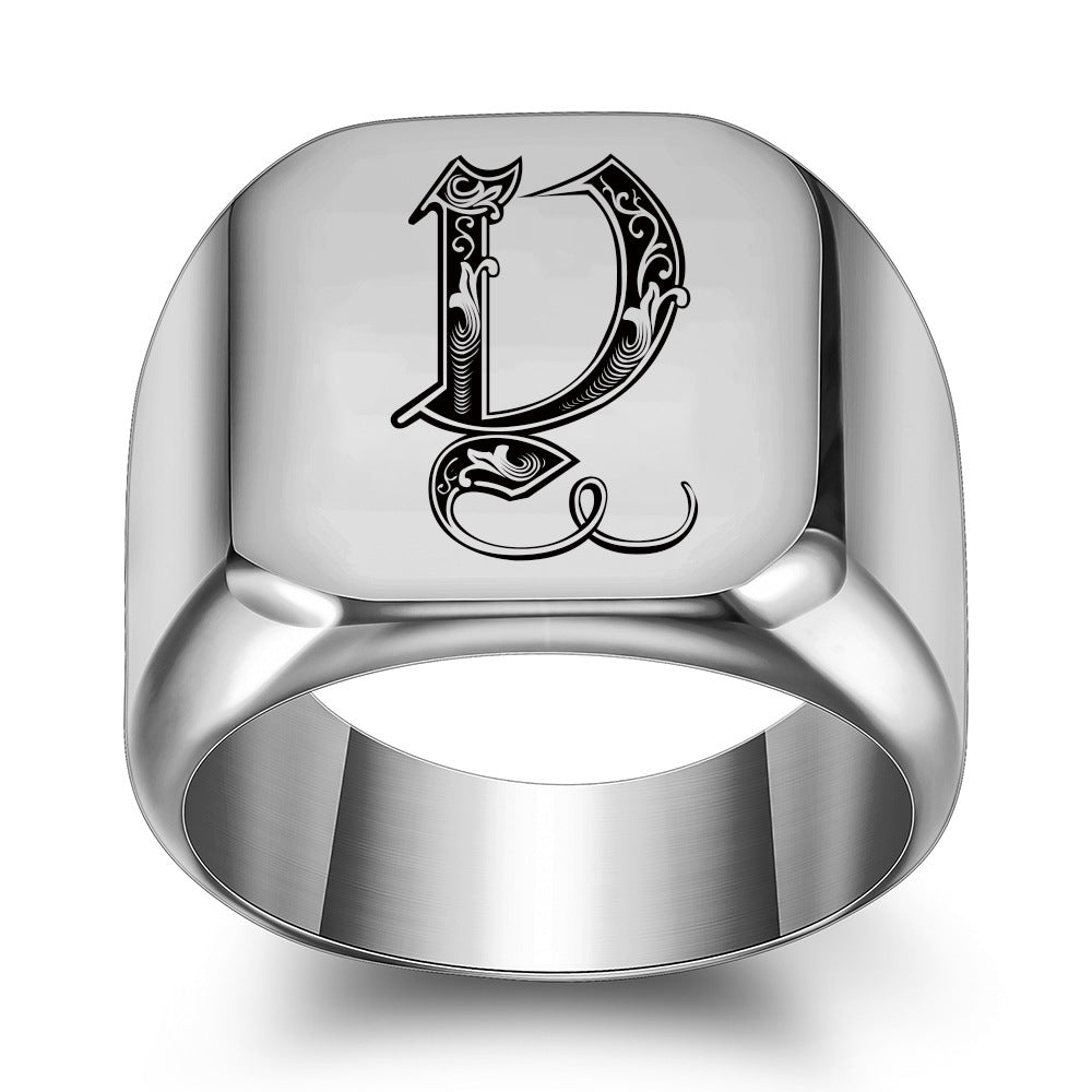 Anello con iniziale in titanio