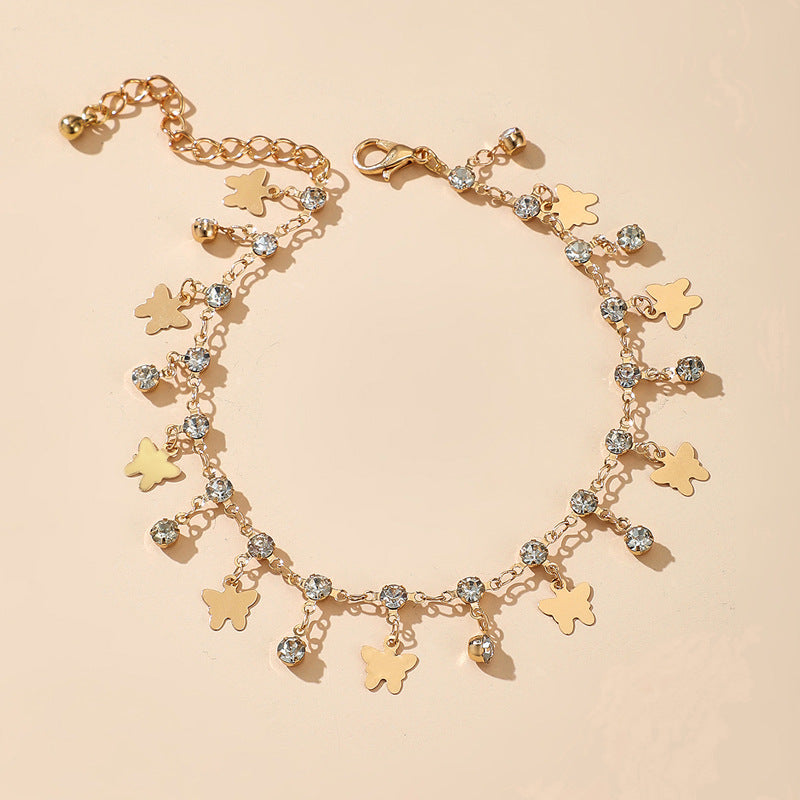 Cavigliera farfalla nappina con strass