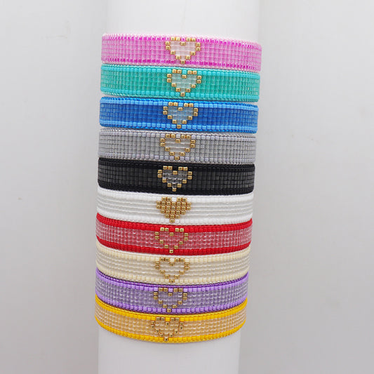 Bracciale tessuto cuore intrecciato