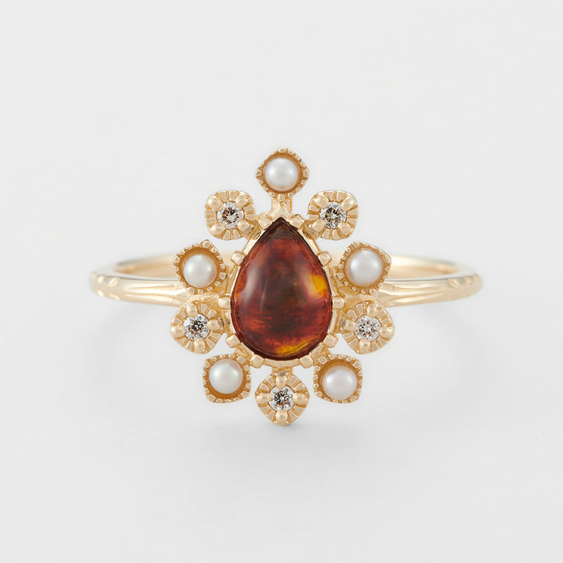 Anello argento dorato con fiore e ambra