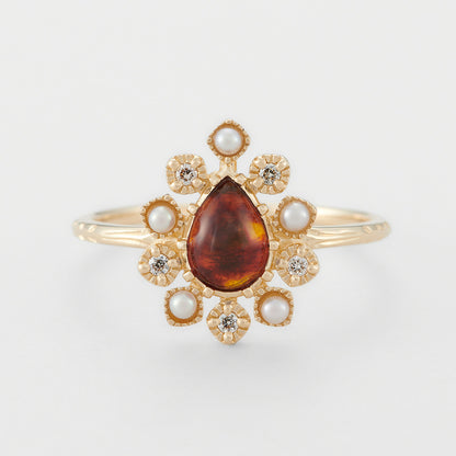 Anello argento dorato con fiore e ambra