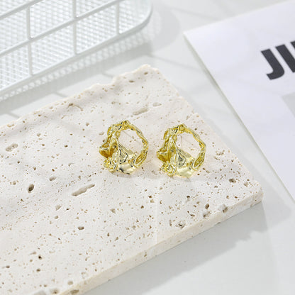 Orecchini geometrici irregolari in metallo