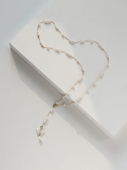 Collana con farfalla e perle