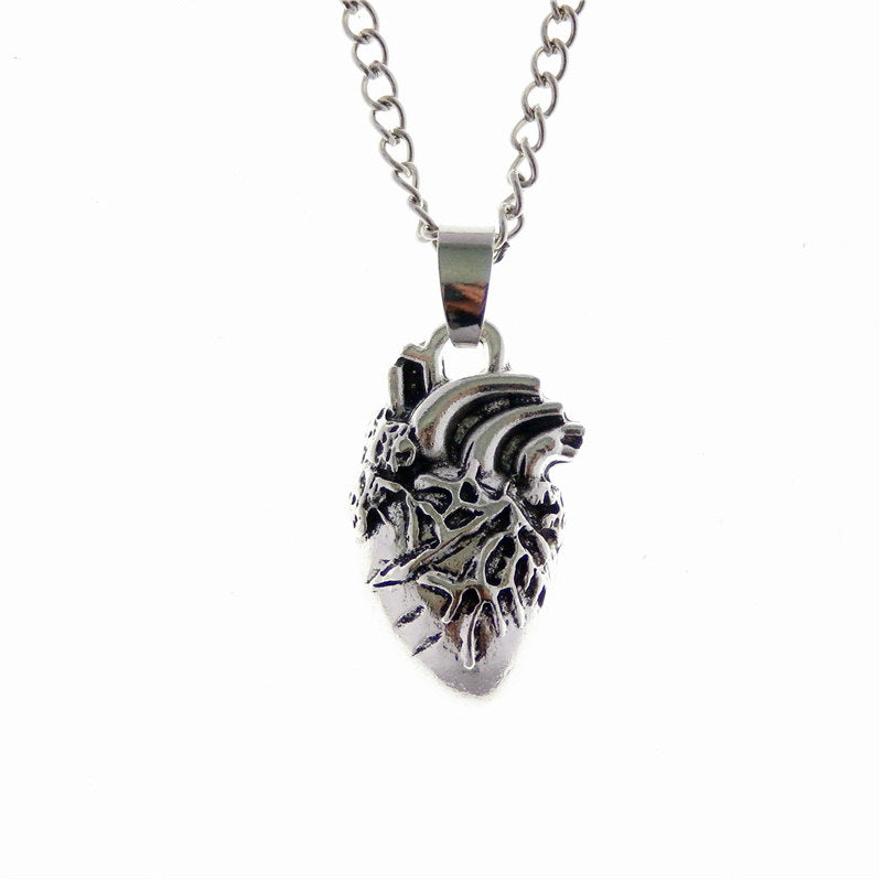 Collana teschio e cuore anatomico