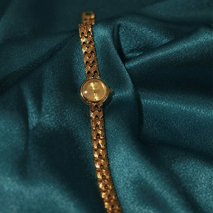 Orologio rame intrecciato