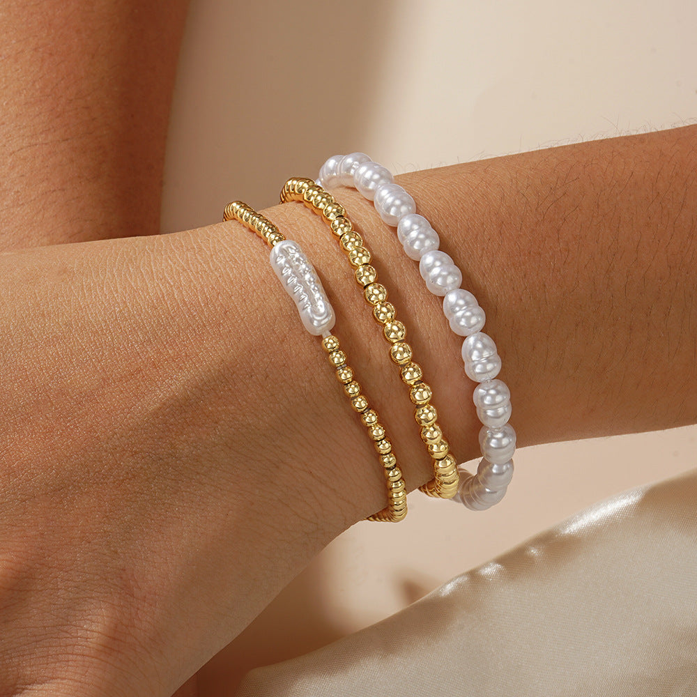 Bracciale perle e sfere dorate