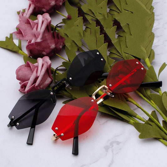 Occhiali da sole rimless losangati