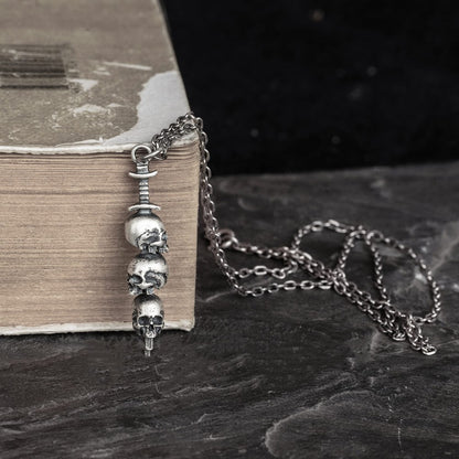 Collana teschio e spada