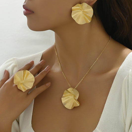 Collana, anello e orecchini loto