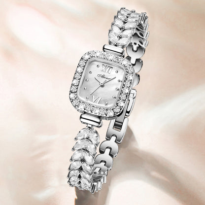 Orologio quadrato spike dorato