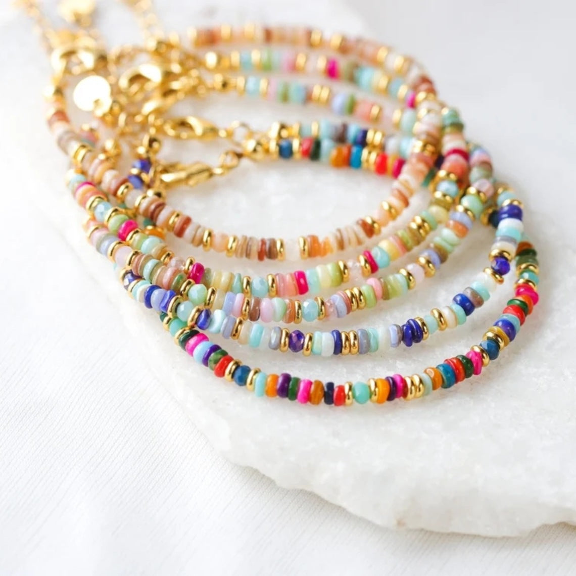 Bracciale conchiglia tessuto