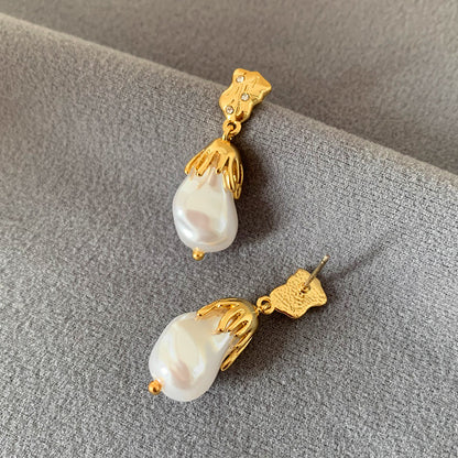 Orecchini barocchi perle foglia d'oro
