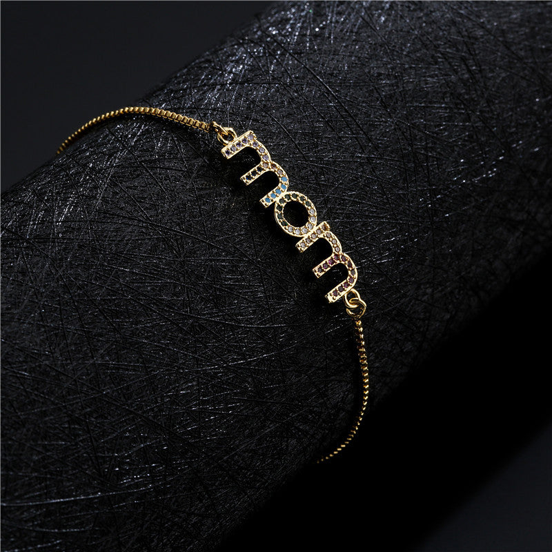 Braccialetto charm mamma oro